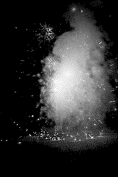 A black and white image of a firework